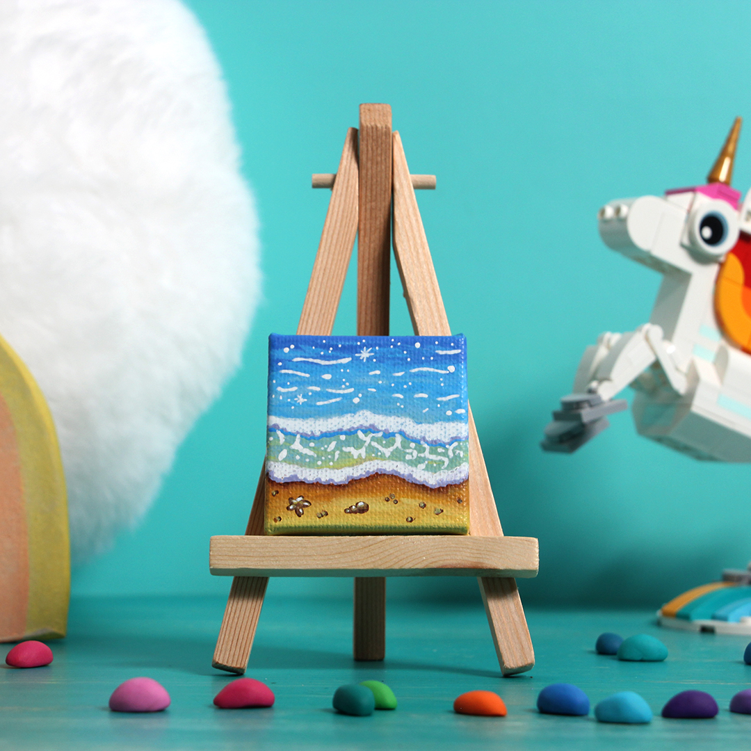 Am Strand, blau: 5x5 cm - 10 EUR